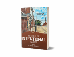 Book cover of The Case of the Intentional Accident by Deborah Sprinkle, depicting a small town street scene with brick buildings, church steeple, and magnifying glass logo. A Mac & Sam Mystery.
