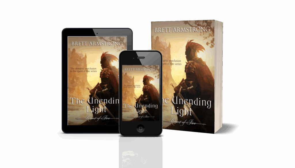 A 3D promotional graphic showing multiple formats of the book The Unending Light by Brett Armstrong from the Quest of Fire series. The display includes a paperback, a tablet, and a smartphone, all featuring the same cover art. The cover depicts a warrior in red armor with a plume on his helmet, seated with his sword, looking toward a golden, glowing horizon with rocky cliffs in the distance. The tagline reads, “The climactic conclusion to the Quest of Fire series.”