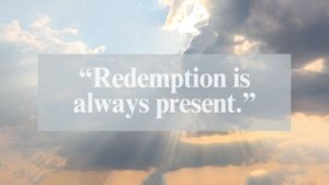 Soft sunlight breaks through dramatic clouds in the sky, with the overlaid quote: “Redemption is always present.”