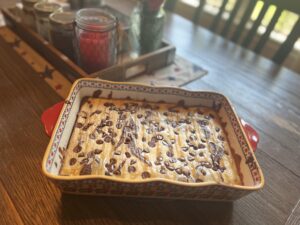 Caramel Cheesecake Brownies in a pan